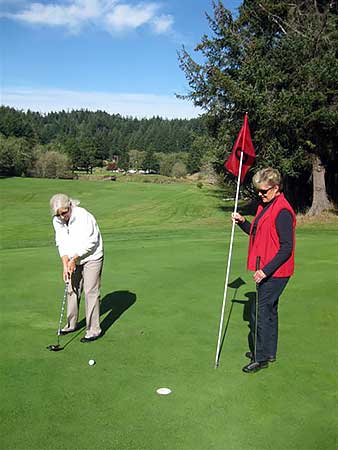 Golfers on the Cedar Bend course
